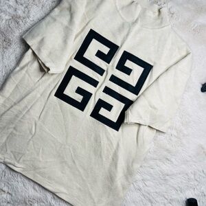 Cream Sweater with Black Geometric Design